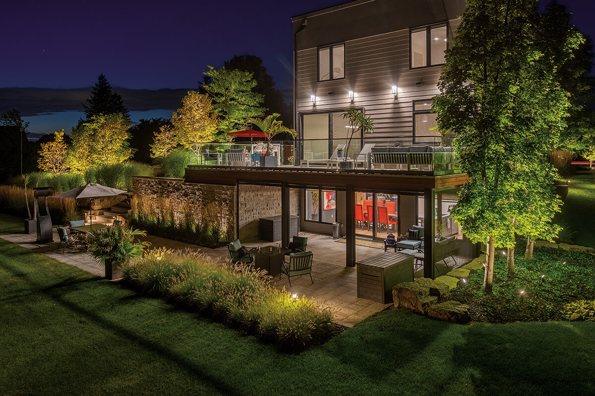 house backyard lit up at night