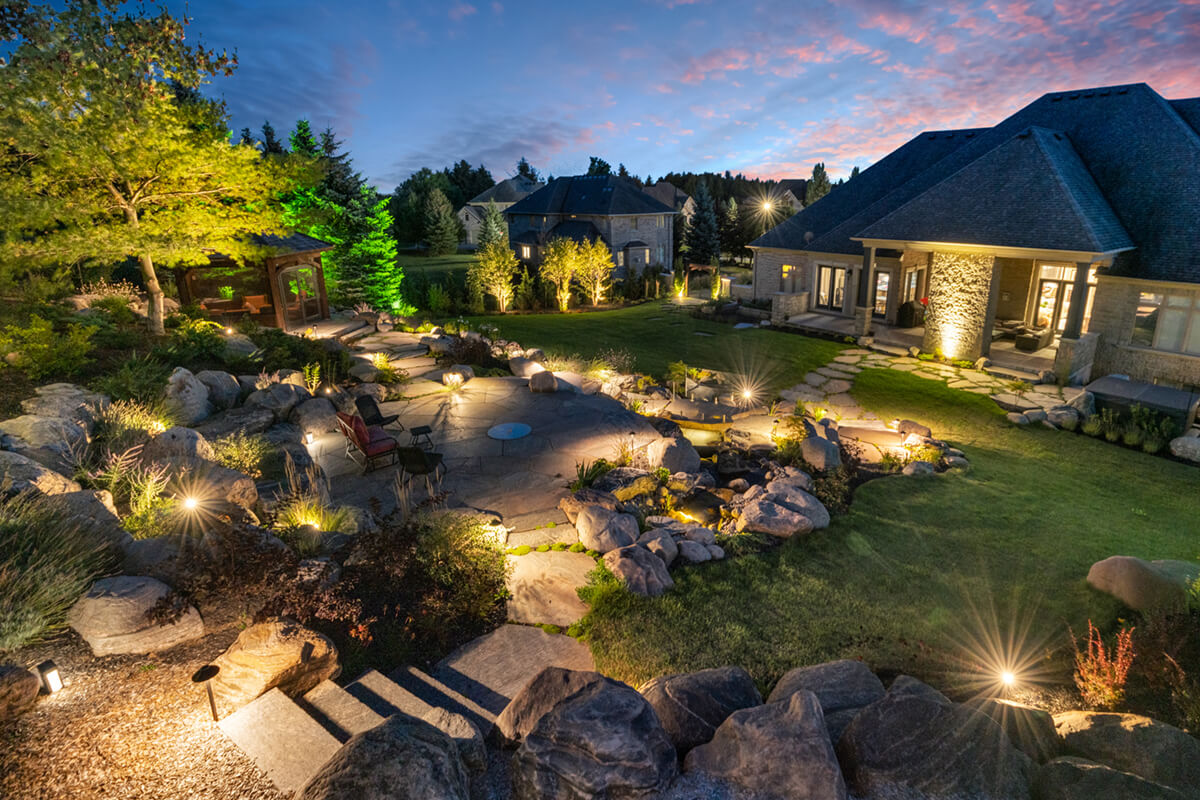 large backyard lit up at night