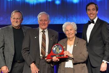 Recipients receiving an award on stage